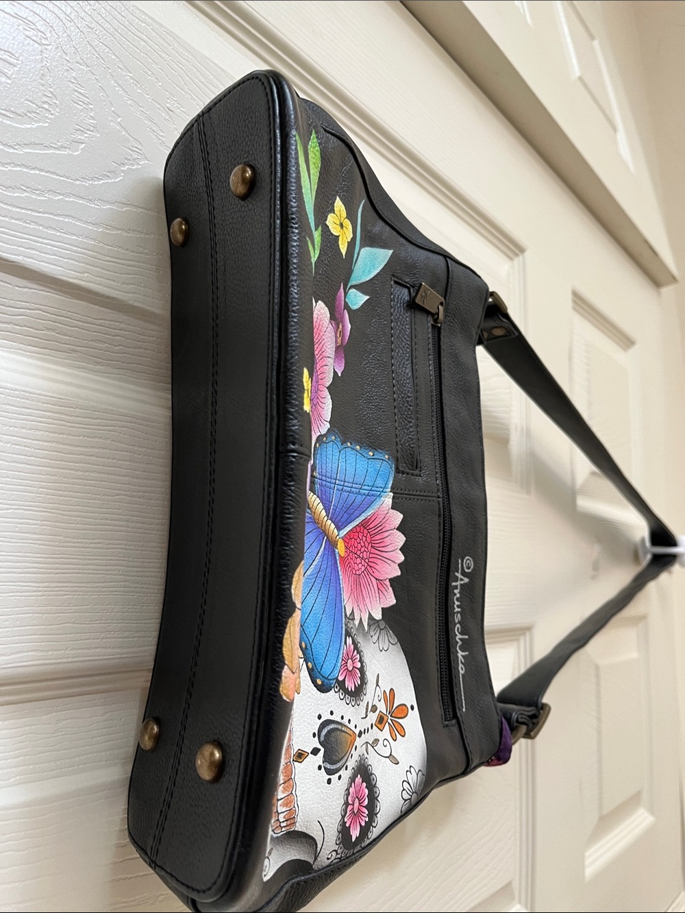 Anuschka Black Crossbody with Colorful Floral, Butterfly & Skull Art - Picture 7 of 7